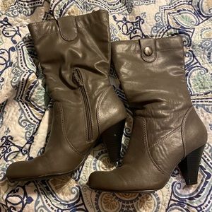 Grey heeled boots. Very comfy, I just never wear them.